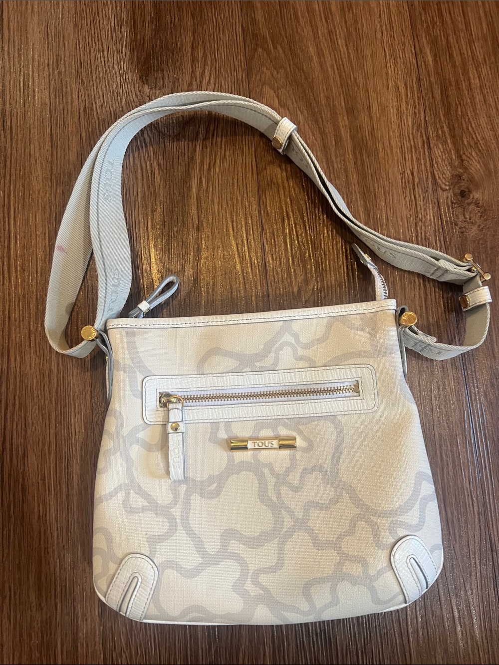 TOUS Cream Ivory Crossbody Bag with Subtle Pattern and Gold Accents